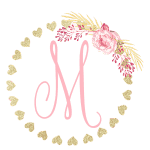 Gold heart frame with the Initial M