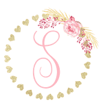Gold heart frame with the Initial S
