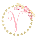 Gold heart frame with the Initial V