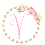 Gold heart frame with the Initial V