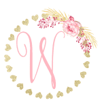 Gold heart frame with the Initial W
