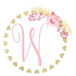 Gold heart frame with the Initial W