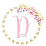 Gold heart frame with the letter D