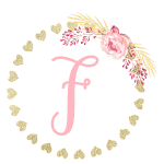 Gold heart frame with the letter F