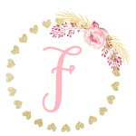 Gold heart frame with the letter F