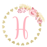 Gold heart frame with the Letter H