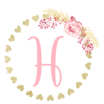 Gold heart frame with the Letter H